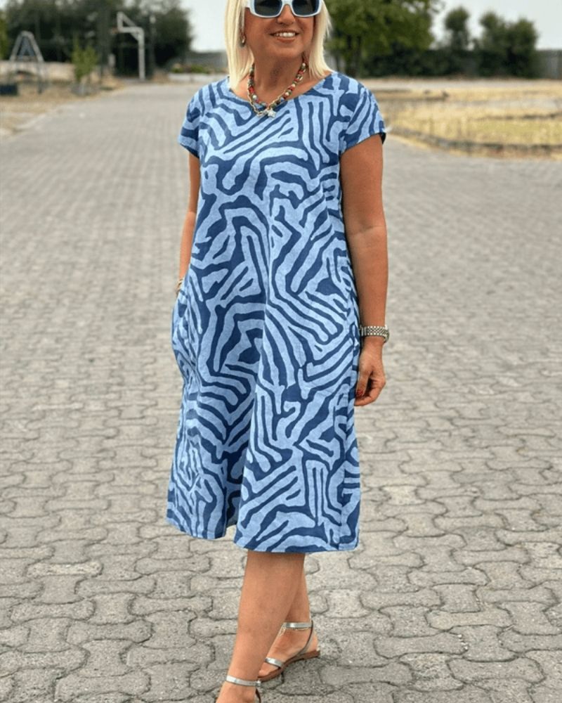Nelia – Dress with round neck and pattern